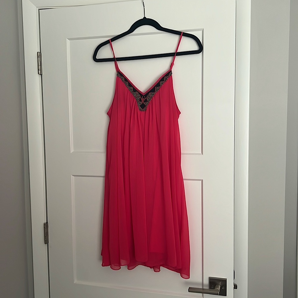 Bright pink dress with beaded neckline